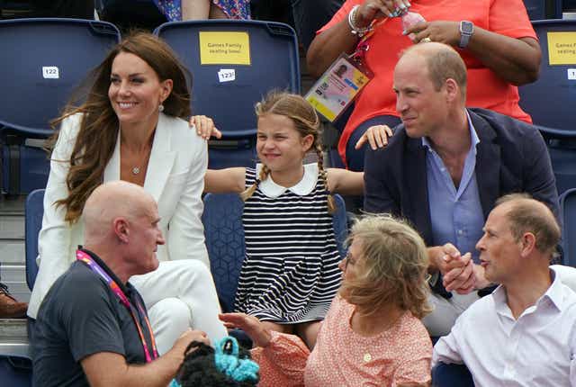 The Duke and Duchess of Cambridge with Princess Charlotte seated behind the Earl and Countess of Wessex at the University of Birmingham Hockey and Squash Centre on day five of the 2022 Commonwealth Games in Birmingham (Joe Giddens/PA)