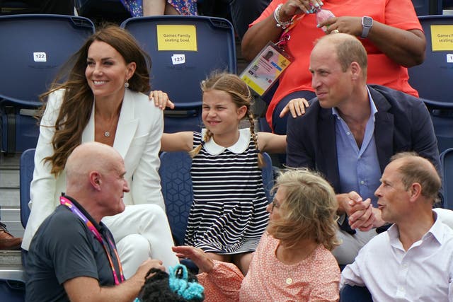 The Duke and Duchess of Cambridge with Princess Charlotte seated behind the Earl and Countess of Wessex at the University of Birmingham Hockey and Squash Centre on day five of the 2022 Commonwealth Games in Birmingham (Joe Giddens/PA)