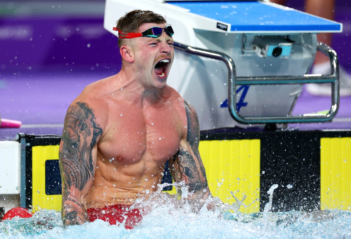 ‘Wounded lion’ Adam Peaty roars back to win redemptive 50m breaststroke gold