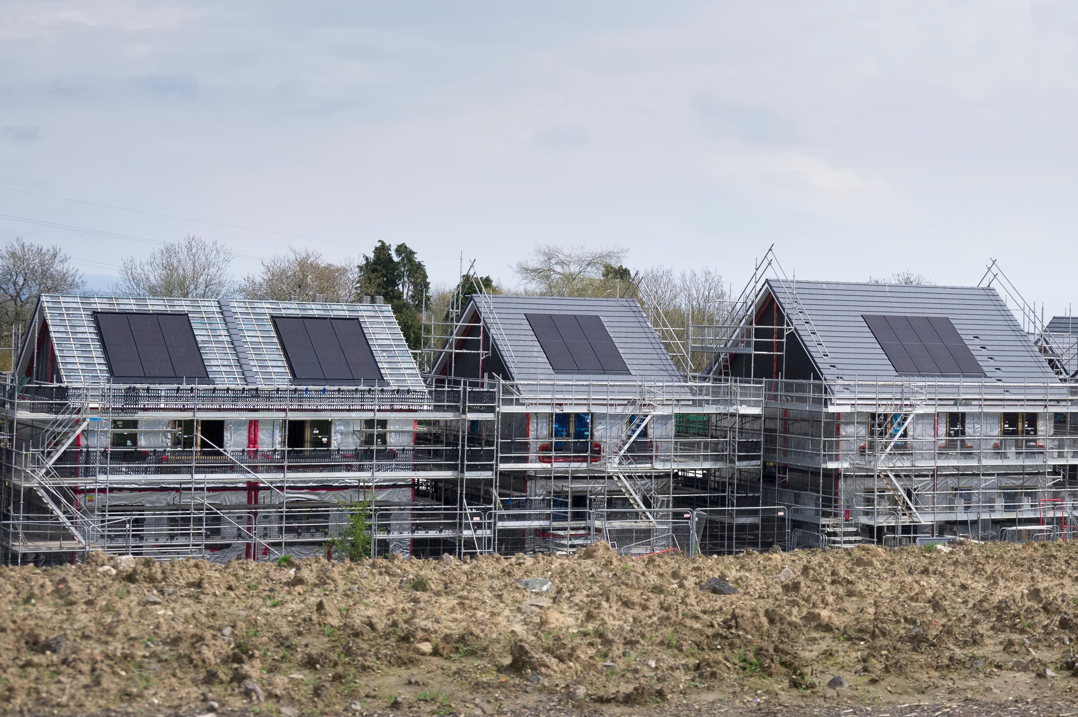 Solar panels being fitted onto new houses in Scotland