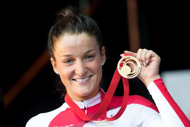 England’s Lizzie Armitstead – now Deignan – celebrates gold in the road race (Tim Ireland/PA)
