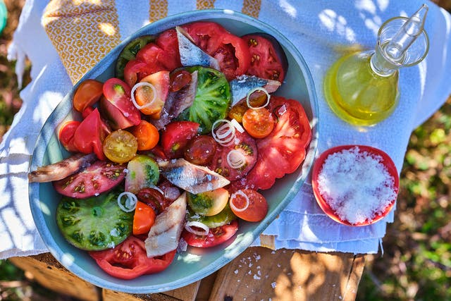 <p>Sardines give the humble tomato salad smoky depth </p>