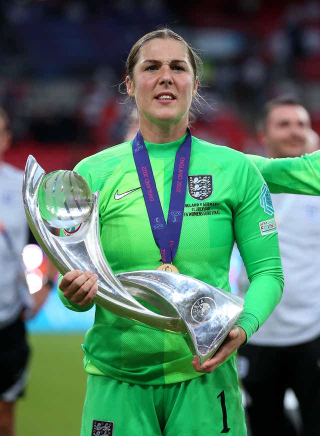 England goalkeeper Mary Earps celebrates with the trophy (Nigel French/PA)