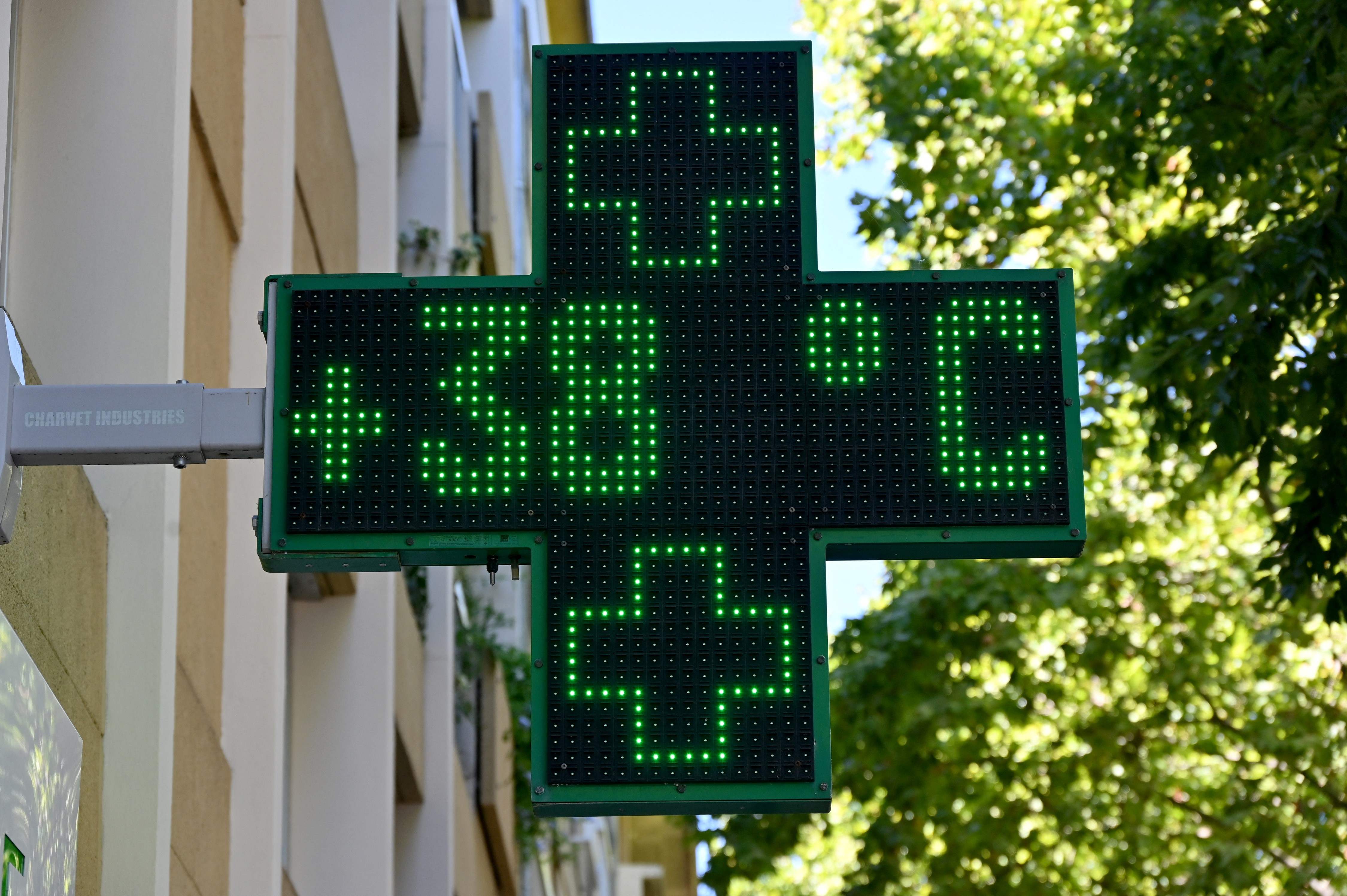 A pharmacy sign records the temperature in Nimes, France, on 1 August, 2022
