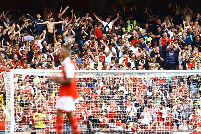 <p>Arsenal fans celebrate at Arsenal v Everton in May 2022</p>