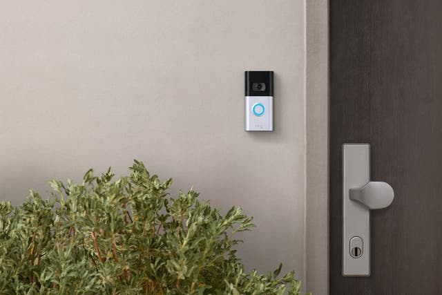 A handout image of a Ring smart video doorbell attached to a wall outside a home (Ring/PA)