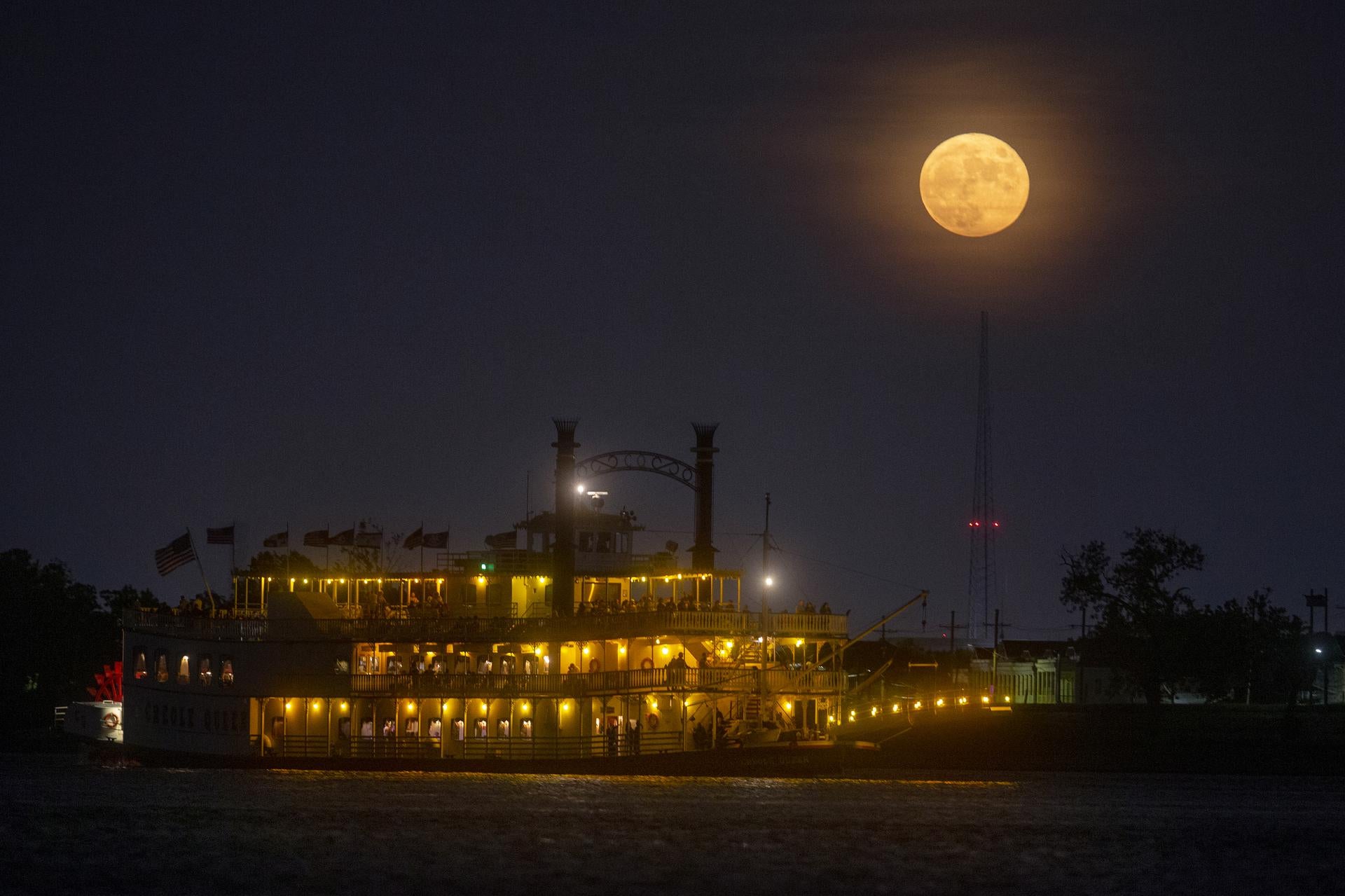 An August Sturgeon Moon rises over New Orleans in 2021