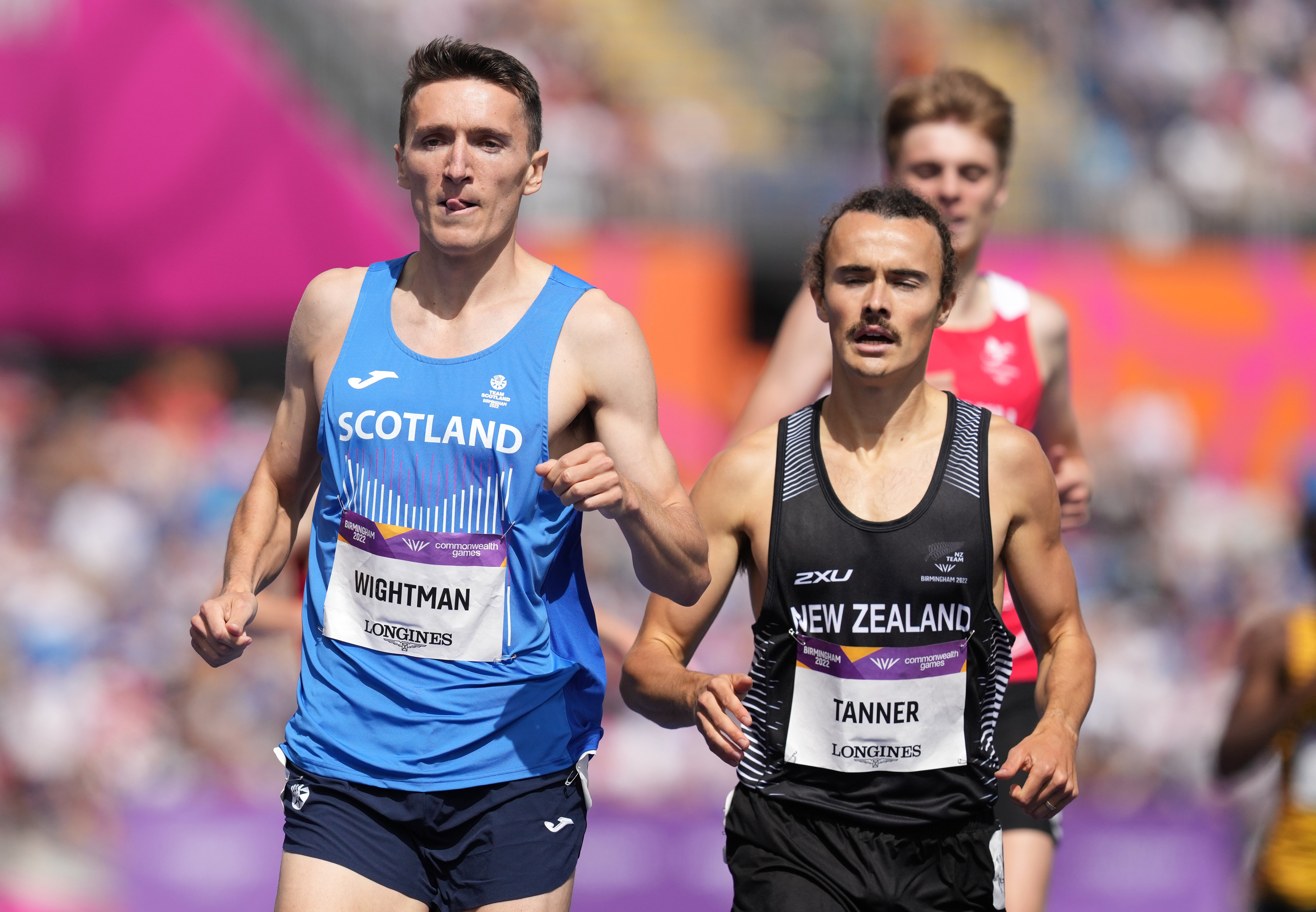 Jake Wightman, left, eased through in his first race as a world champion (Martin Rickett/PA)