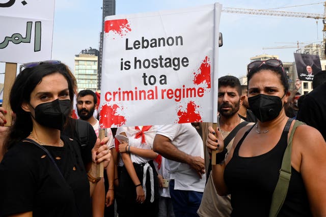 <p>People attend the protest on the second anniversary of the Beirut Port explosion</p>