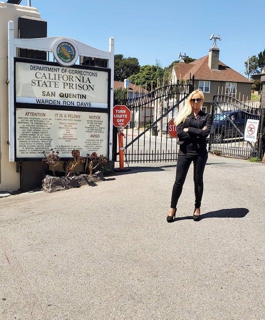 Forensic psychology practitioner Laura Brand, who has interviewed dozens of serial killers, stands outside of San Quentin prison in California