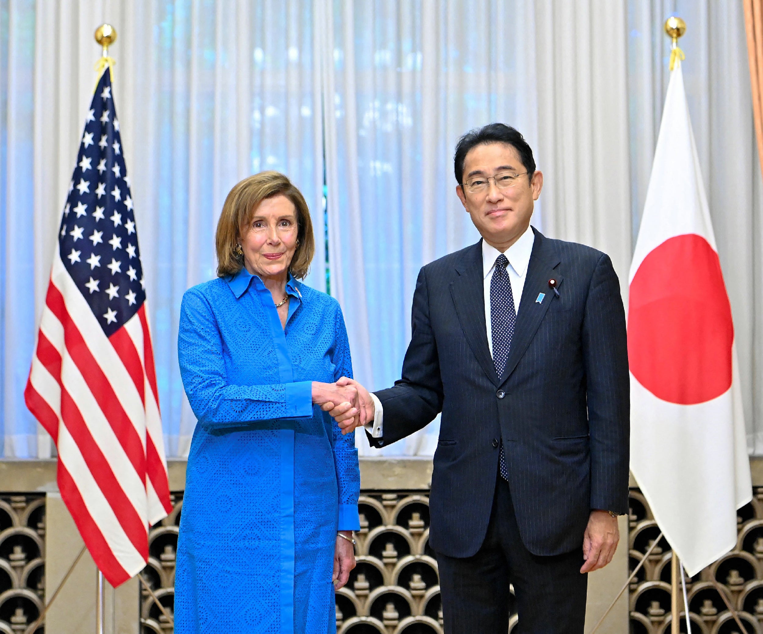 US House speaker Nancy Pelosi shakes hands with Japanese prime minister Fumio Kishida during a meeting at the prime minister’s official residence in Tokyo on 5 August 2022