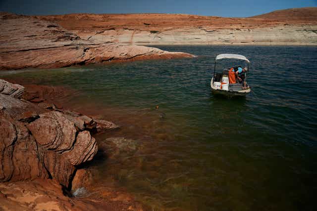 <p>Lake Powell, a dam on the Colorado River, pictured on June 7, 2022, in Page, Arizona. The dam is at a historic low amid a 20-year ‘megadrought’ in the US West </p>
