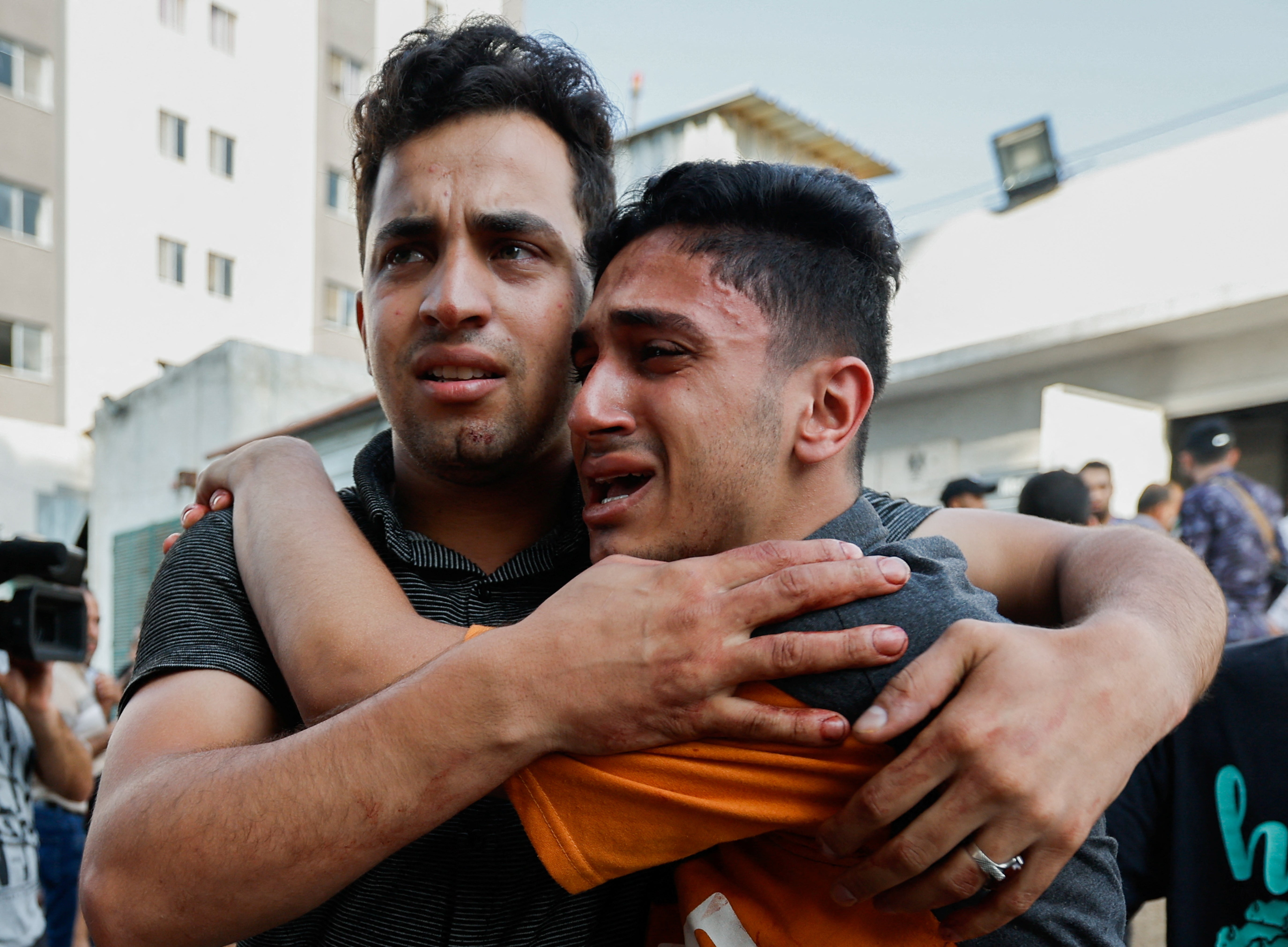 Palestinians at a hospital following Israeli strikes in Gaza City