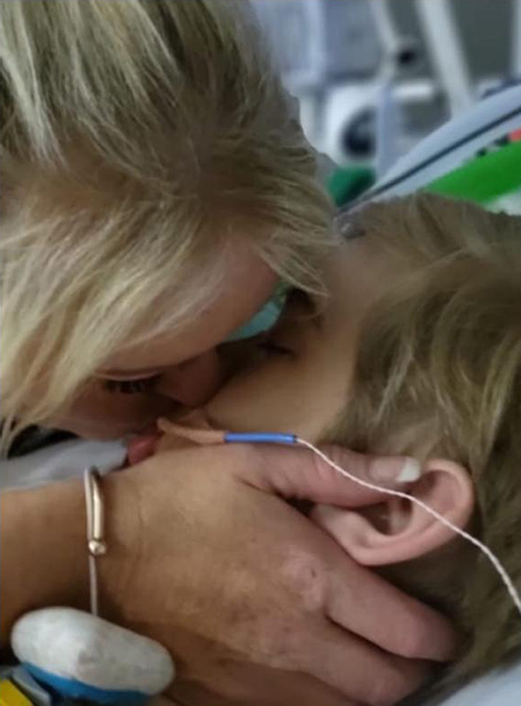Hollie Dance with her son in hospital