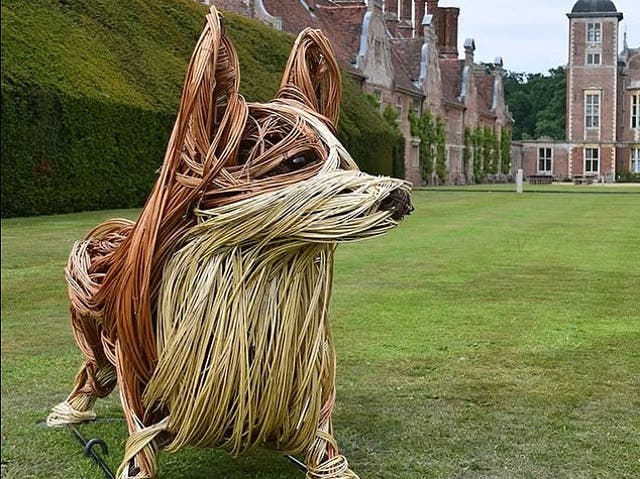 <p>One of the seven wicker corgi sculptures</p>
