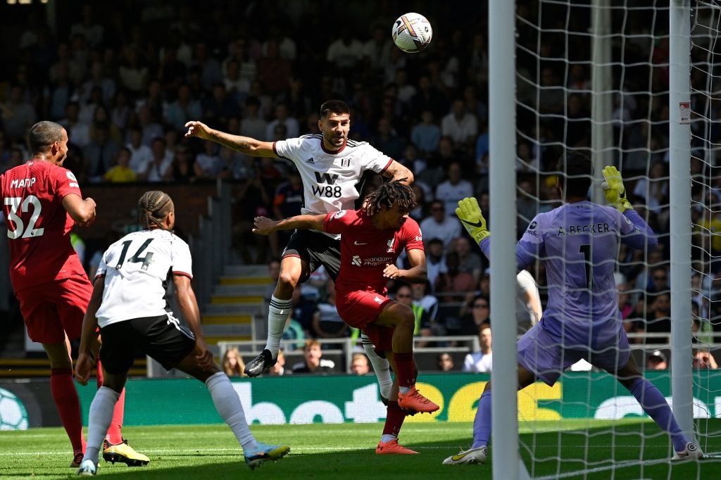 Fulham’s Aleksandar Mitrovic heads home the opening goal