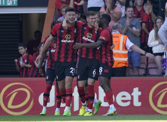 <p>Kieffer Moore (left) is congratulated after scoring Bournemouth’s second goal </p>