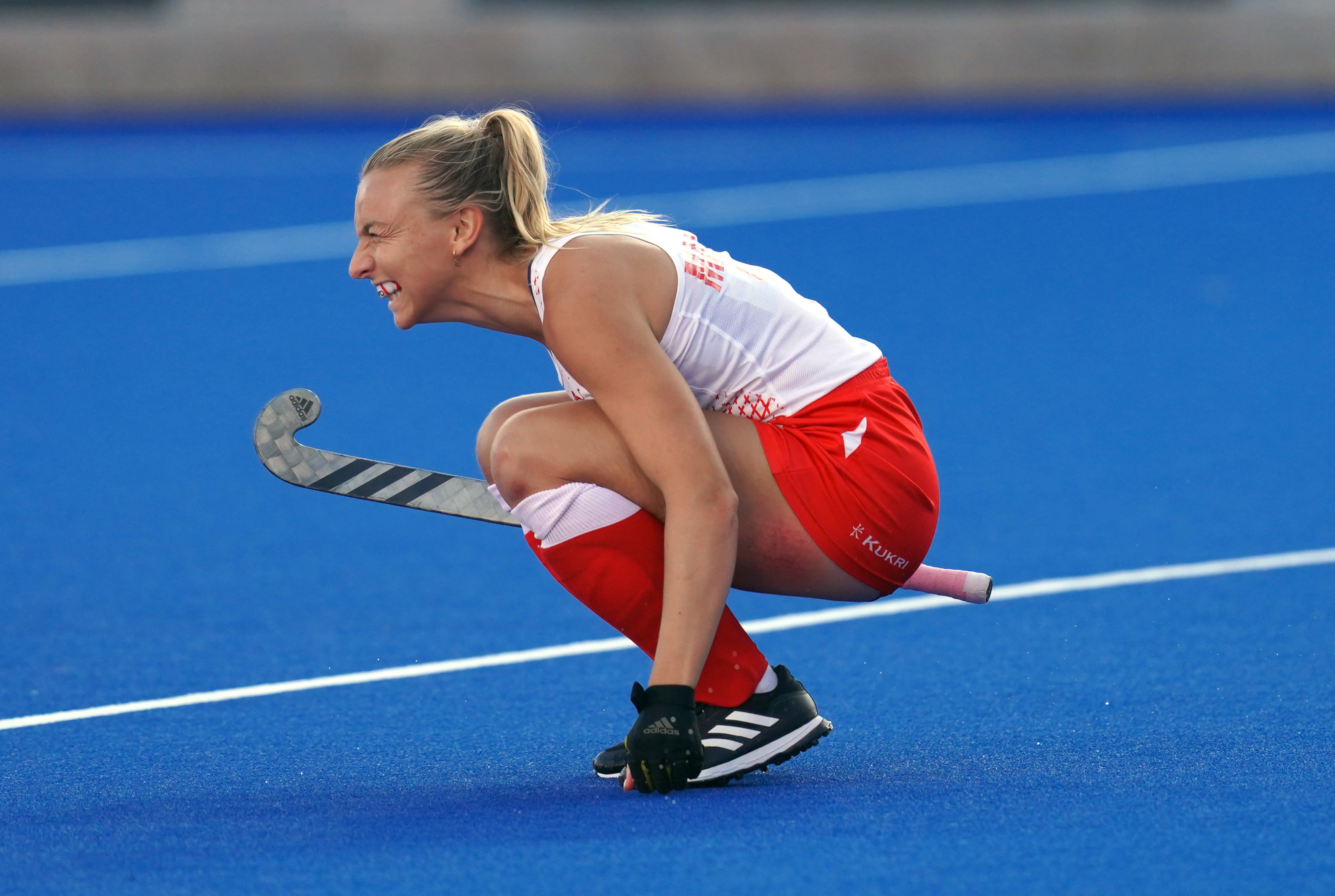 England’s Hannah Martin celebrates after scoring in the penalty shoot-out during the women’s hockey semi-final (PA)