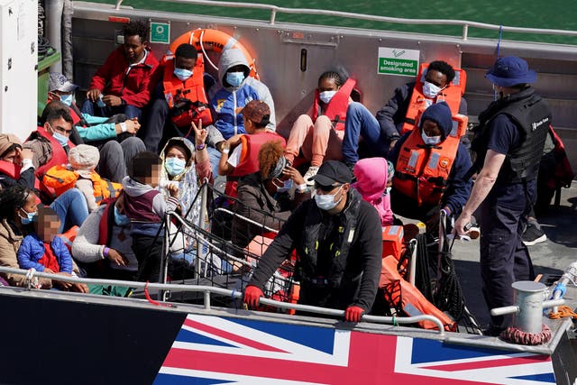 EDITORS NOTE Children’s faces have been pixelated as the PA Picture Desk has been unable to gain the necessary permission to photograph a child under 16 on issues involving their welfare. A group of people thought to be migrants are brought in to Dover, Kent, onboard a Border Force vessel following a small boat incident in the Channel (Gareth Fuller/PA)