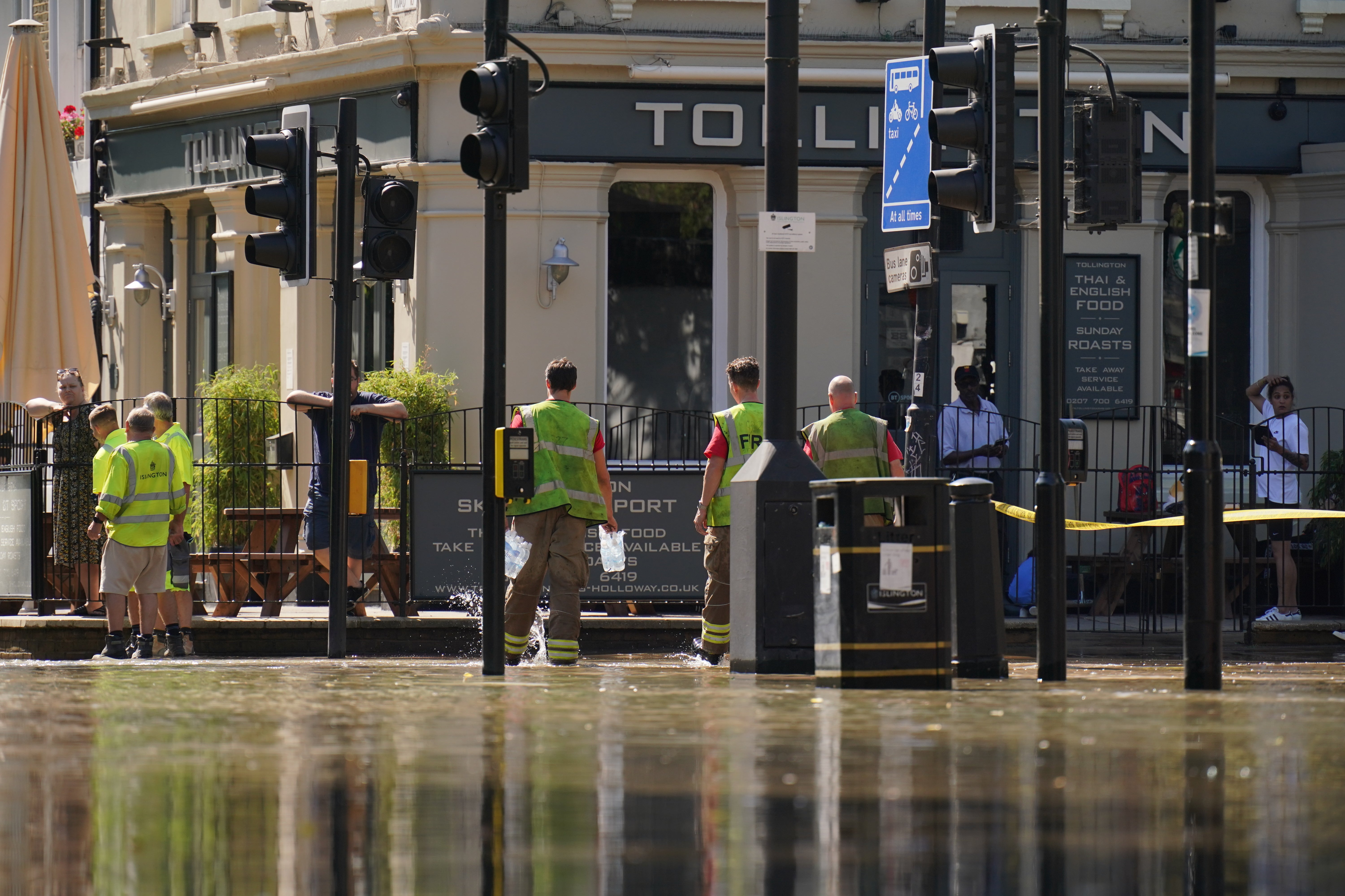 The scene outside the Tollington Arms in Holloway, north London, after a 36-inch water main burst, causing flooding up to four feet deep (Jonathan Brady/PA)