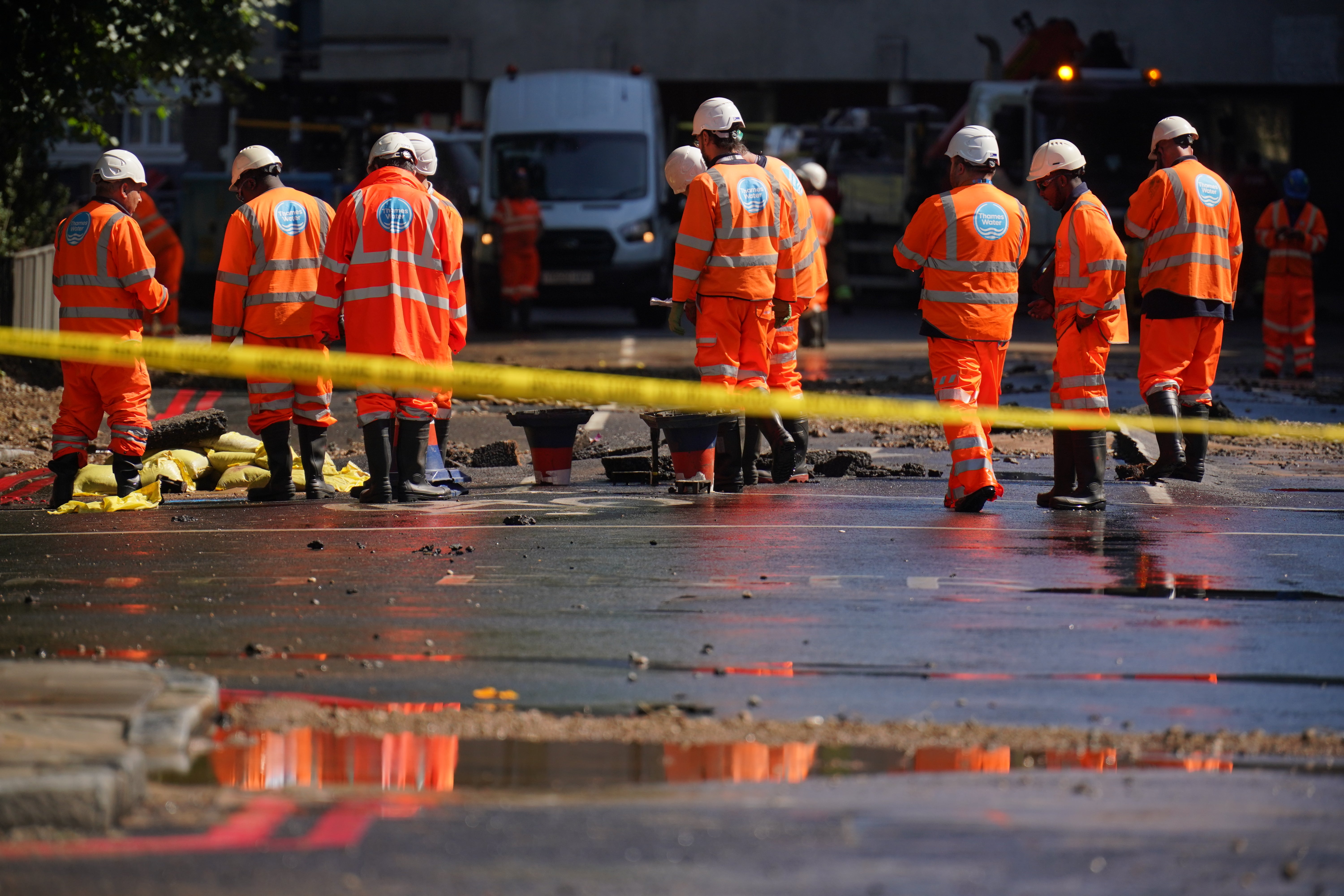 Thames Water officials work in Tollington Road near to the junction with Hornsey Road, Holloway (Jonathan Brady/PA)
