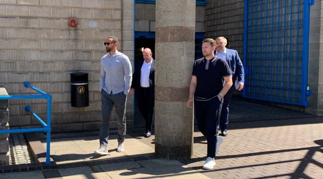 Former England and Manchester United defender Rio Ferdinand (left) leaving Wolverhampton Crown Court, where he is due to give evidence later this afternoon (Richard Vernalls/PA)