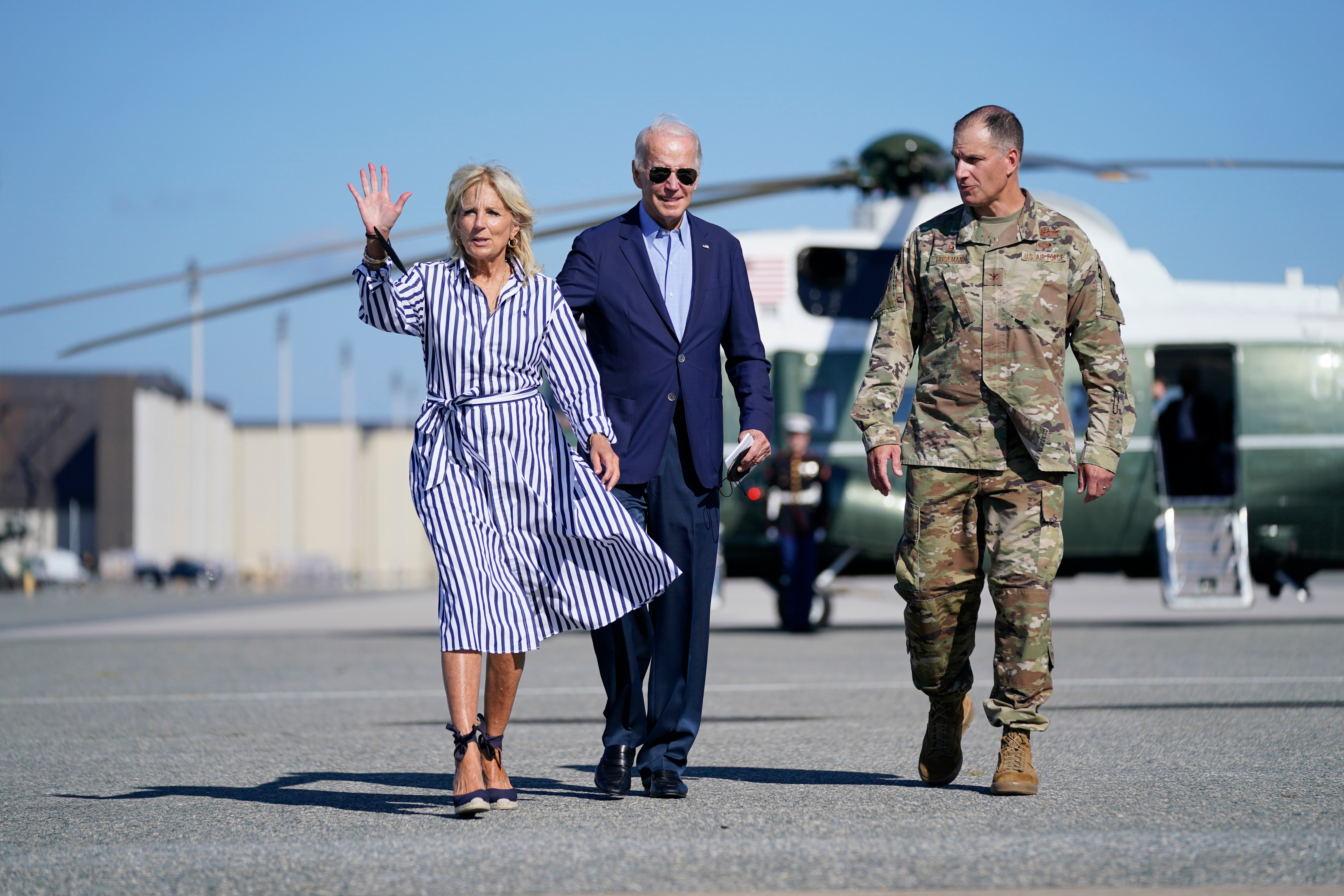 President Joe Biden and First Lady Jill Biden, walk to board Air Force One