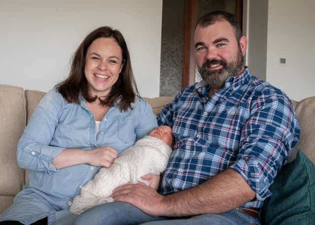 Kate Forbes and Ali MacLennan with baby Naomi (Ruaraidh White/PA)