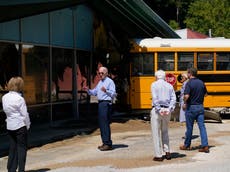 Biden news – live: President tours flood-hit Kentucky after major legislative victory