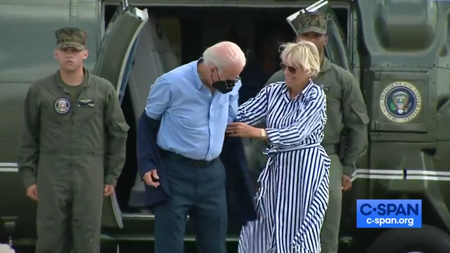 <p>Jill Biden helping struggling Joe Biden put on his jacket  </p>