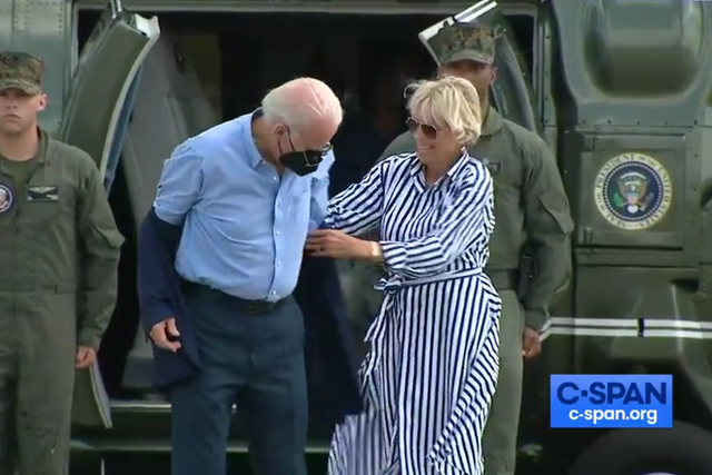 <p>Jill Biden helping struggling Joe Biden put on his jacket  </p>