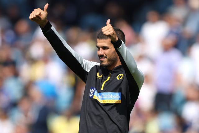 <p>Conor Coady gestures to Wolves fans during the opening weekend fixture at Elland Road</p>
