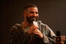 Drake jokes about the tattoo his dad got of his face: ‘Why you do me like this?’