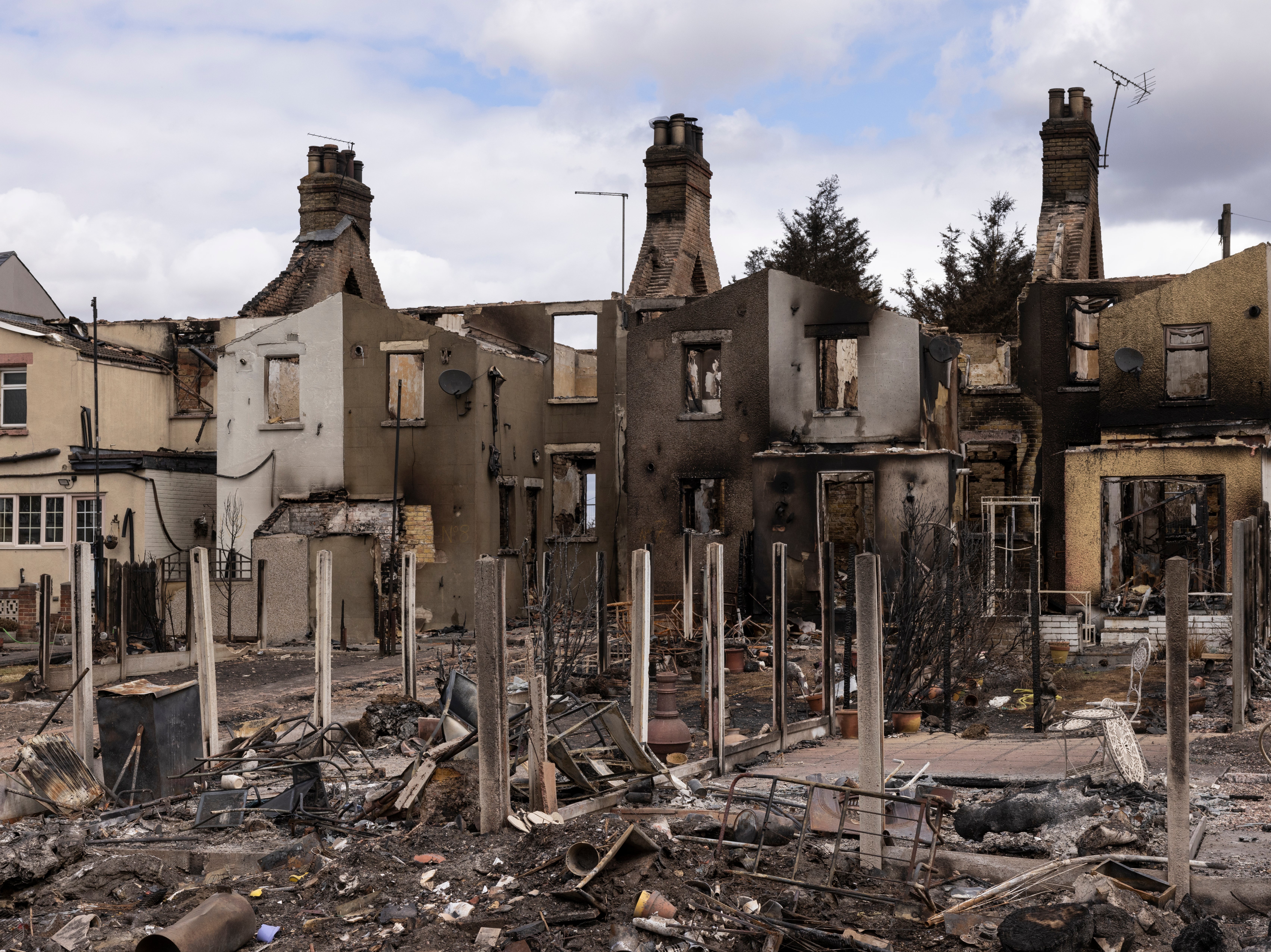 Forty properties were destroyed in Wennington, greater London, last month amid the highest UK temperatures on record