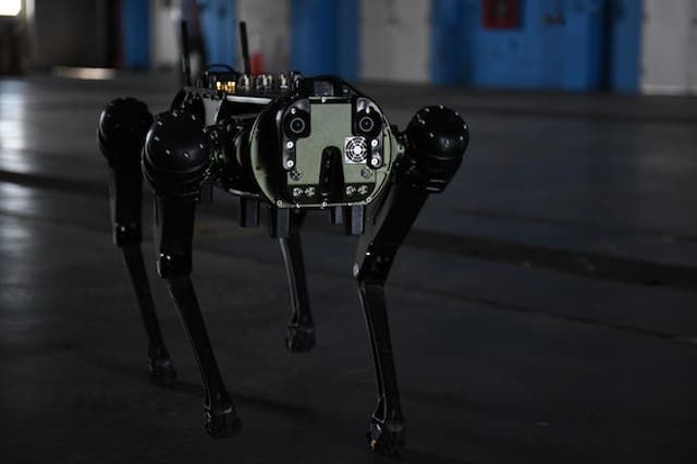 <p>A Ghost Robotics, Vision 60 Quadruped Unmanned Ground Vehicle (Q-UGV) is operated during a demo for 45th Security Forces Squadron at Cape Canaveral Space Force Station, July 28, 2022</p>