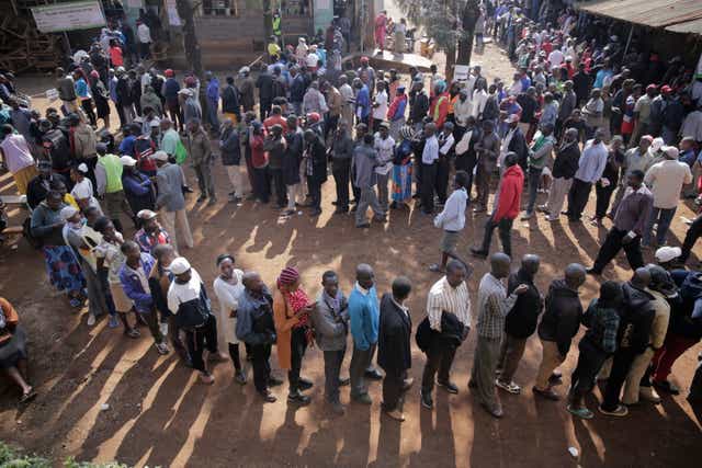 <p>People line up to vote in the Kenyan general election on 9 August, 2022.</p>