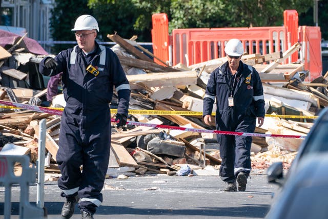 <p>Engineers at the scene of the explosion on Galpin’s Road in Thornton Heath </p>