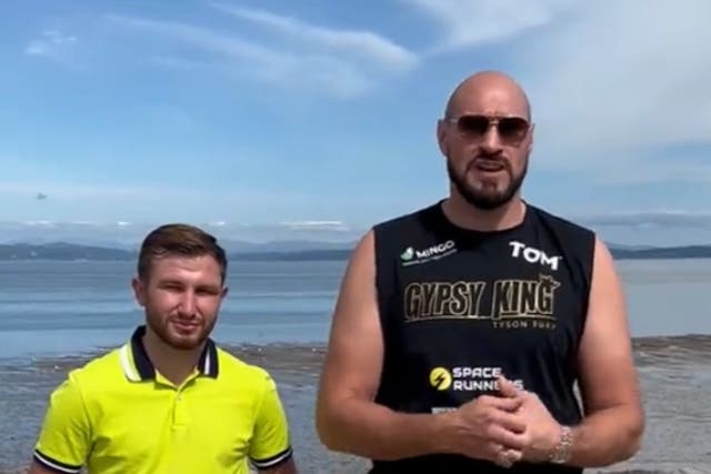 <p>Tyson Fury (right) and Isaac Lowe</p>