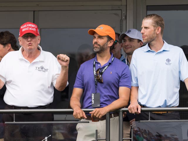 <p>Former US President Donald J. Trump and two of his sons, Donald Trump Jr. and Eric Trump, watch the third round of the LIV Golf Bedminster invitational</p>