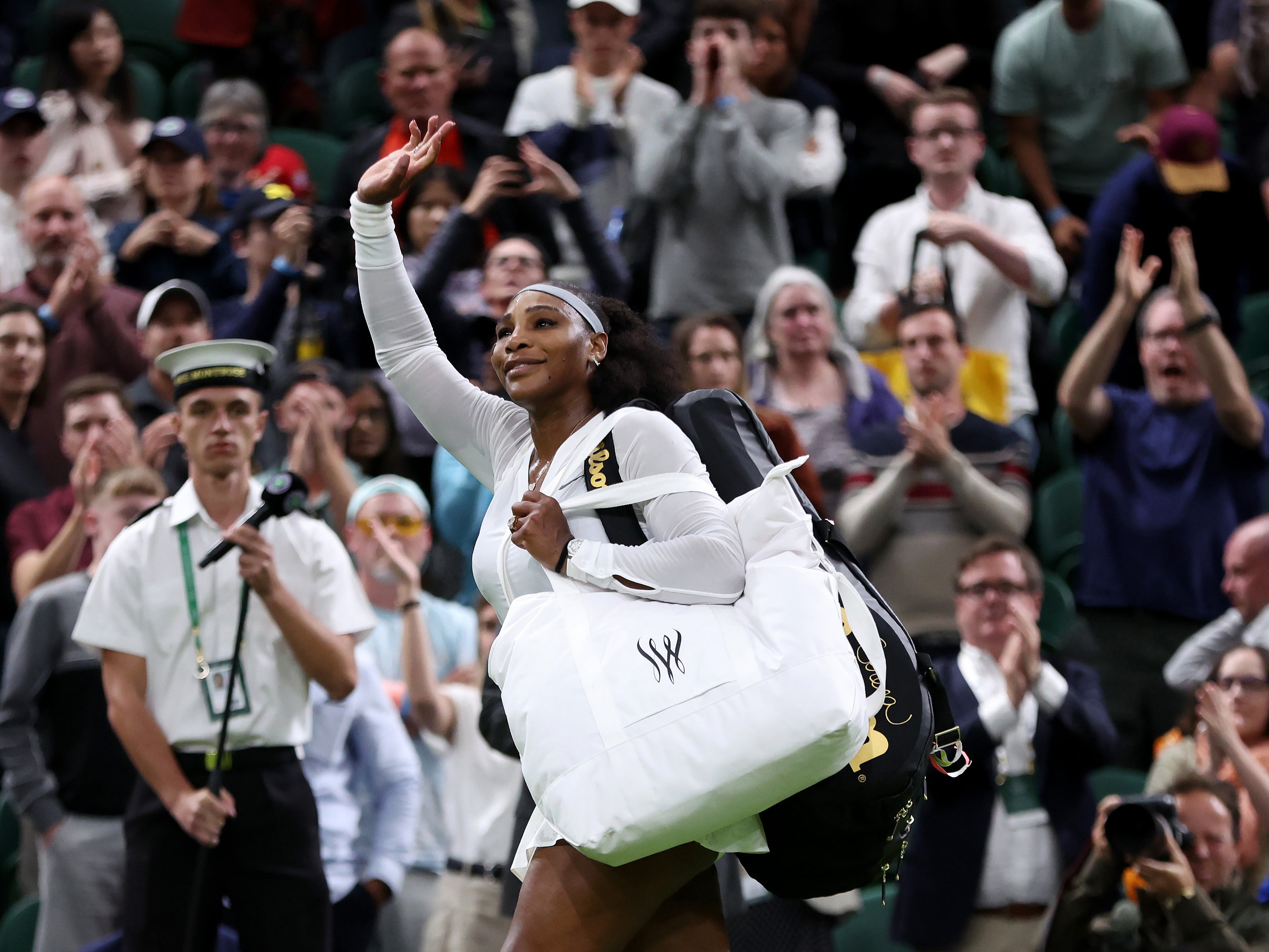 Williams departs Centre Court after her defeat to Harmony Tan at Wimbledon this year