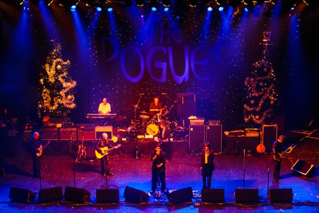 The Pogues performing at Brixton Academy, London (Alamy/PA)