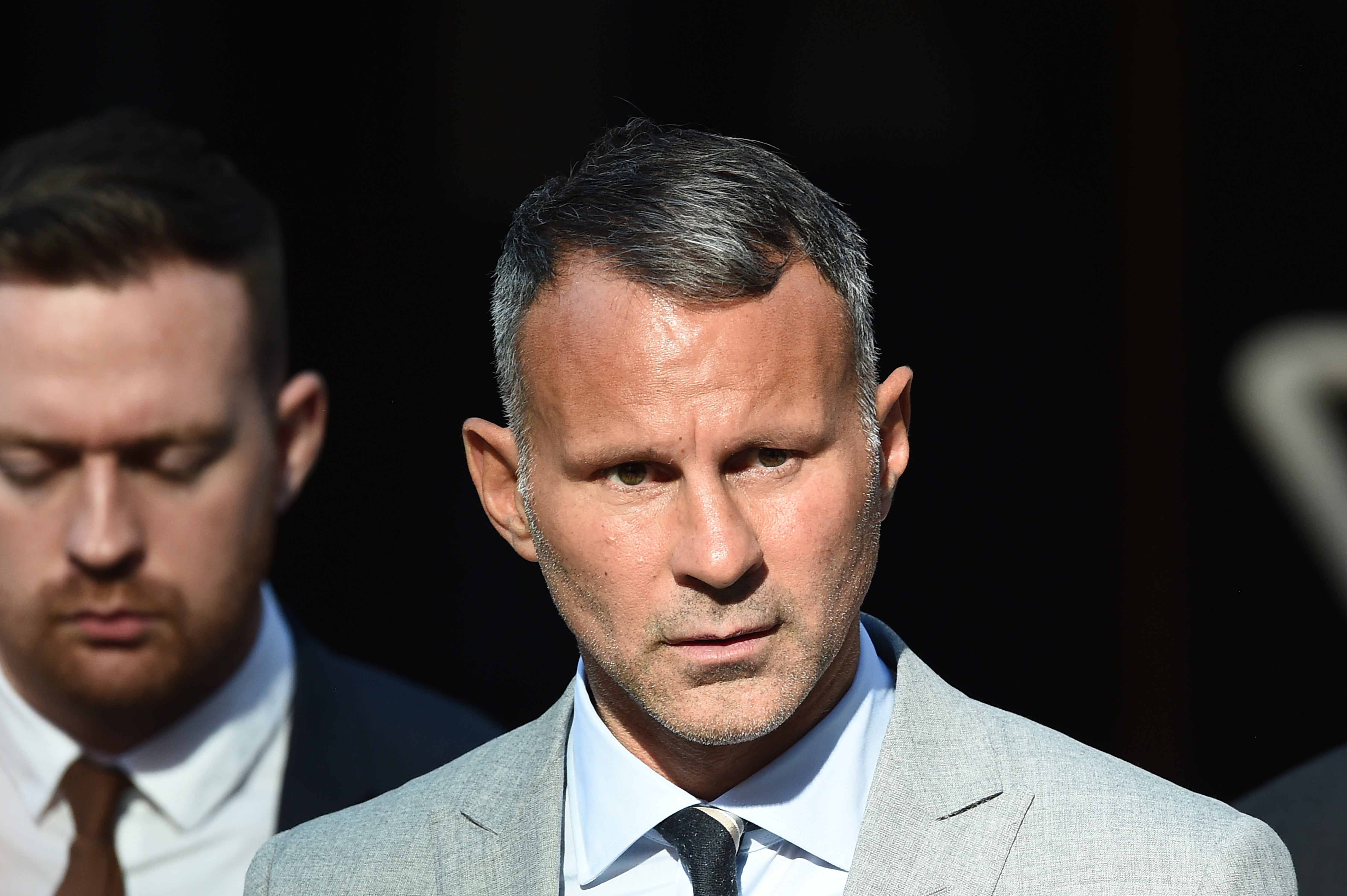 Former Manchester United footballer Ryan Giggs leaving Manchester Crown Court where he is accused of controlling and coercive behaviour against ex-girlfriend Kate Greville between August 2017 and November 2020. Picture date: Tuesday August 9, 2022.
