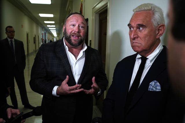 <p>Alex Jones and Roger Stone were among those pleading the Fifth. They are pictured together in Washington DC in 2018 </p>