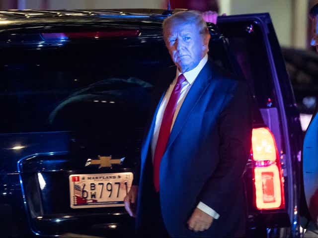 <p>Donald Trump arrives at Trump Tower in New York City on 9 August, the day after FBI agents raided his Mar-a-Lago Palm Beach home</p>