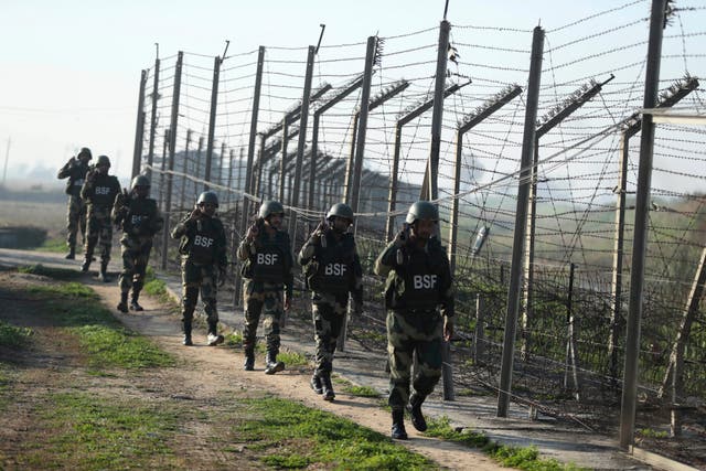 <p>File Indian Border Security Force (BSF) soldiers patrol near the India-Pakistan border fencing at Suchet Garh in Ranbir Singh Pura, Jammu and Kashmir, India</p>