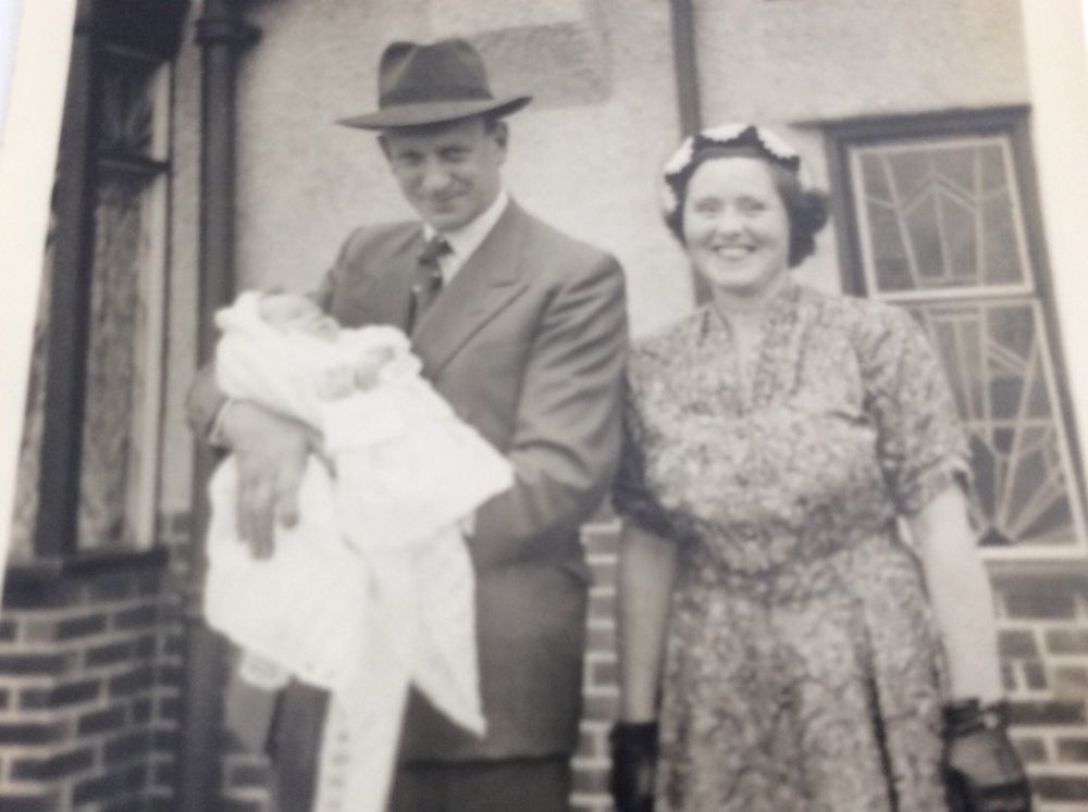 Norah and Harry at Gill’s christening in 1955 (Collect/PA Real Life)