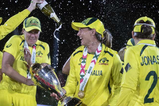 Meg Lanning, with trophy, captained Australia to World Cup glory earlier this year (PA)