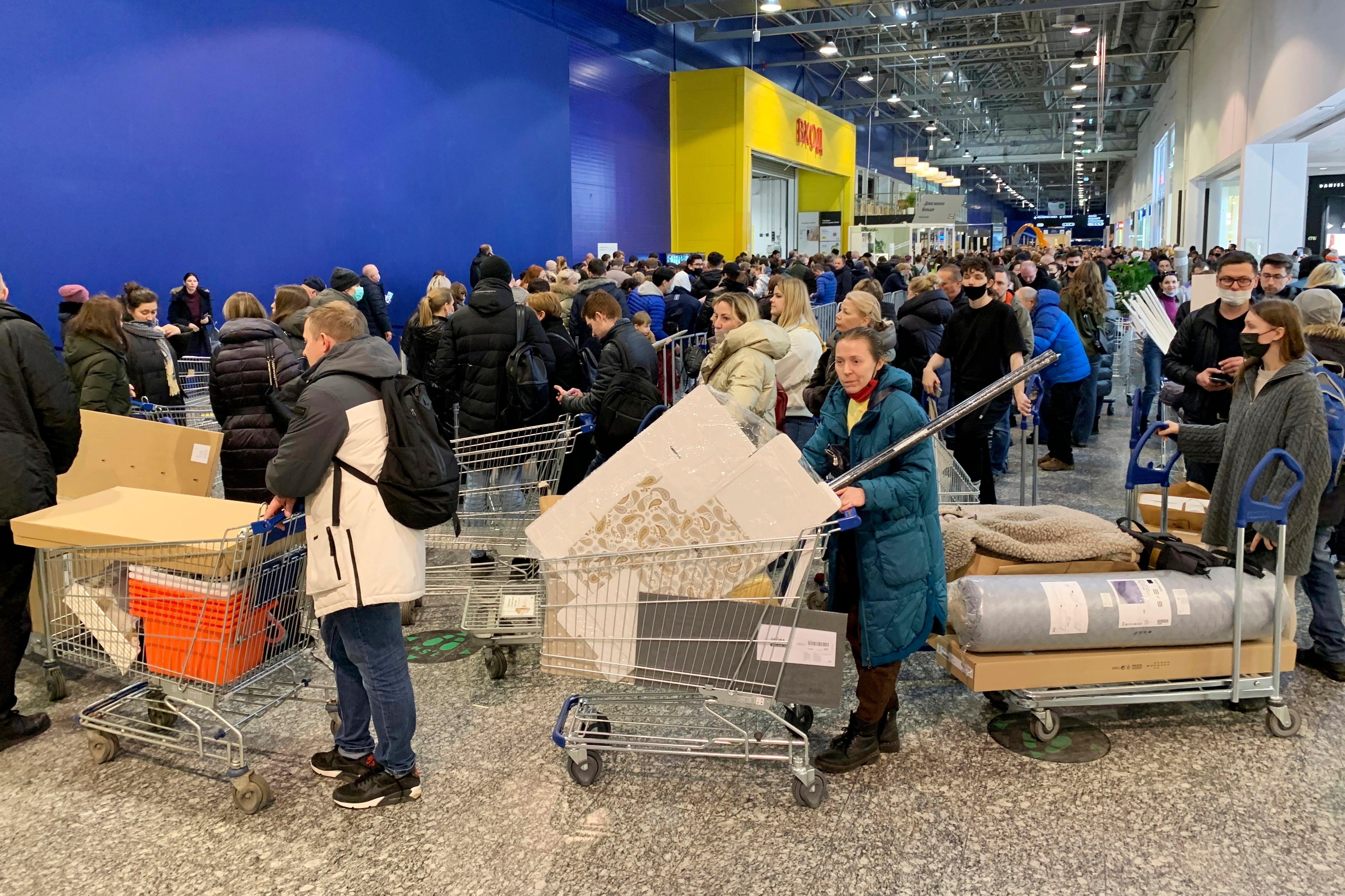 Russian shoppers on the last day of IKEA branches being open