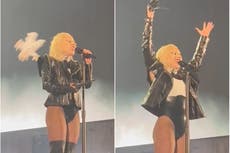 Lady Gaga gets hit in the head with a flying object and carries on performing