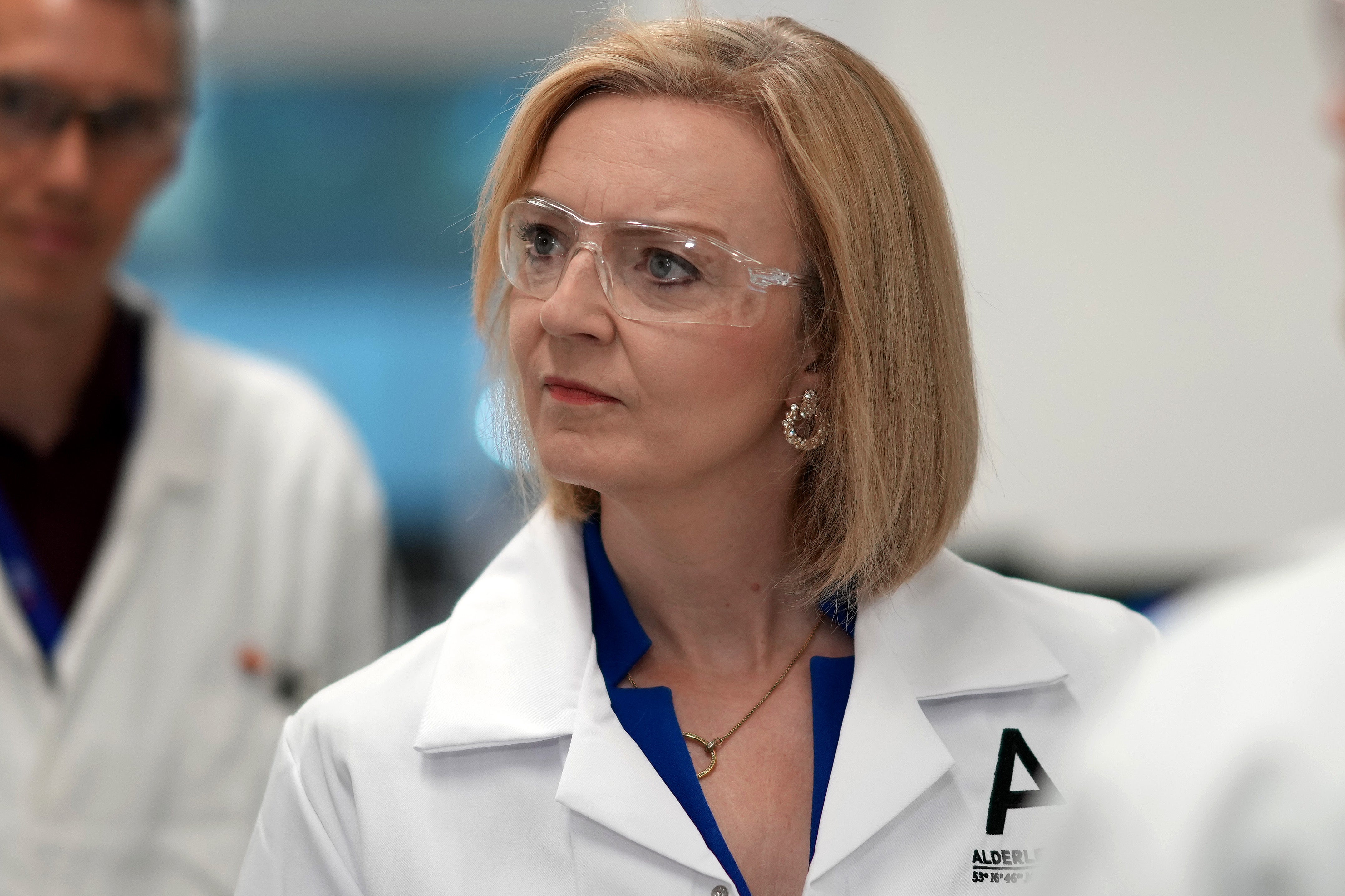 Liz Truss speaks to scientists during a campaign visit to a life sciences laboratory at Alderley Park in Manchester. (Christopher Furlong/PA)